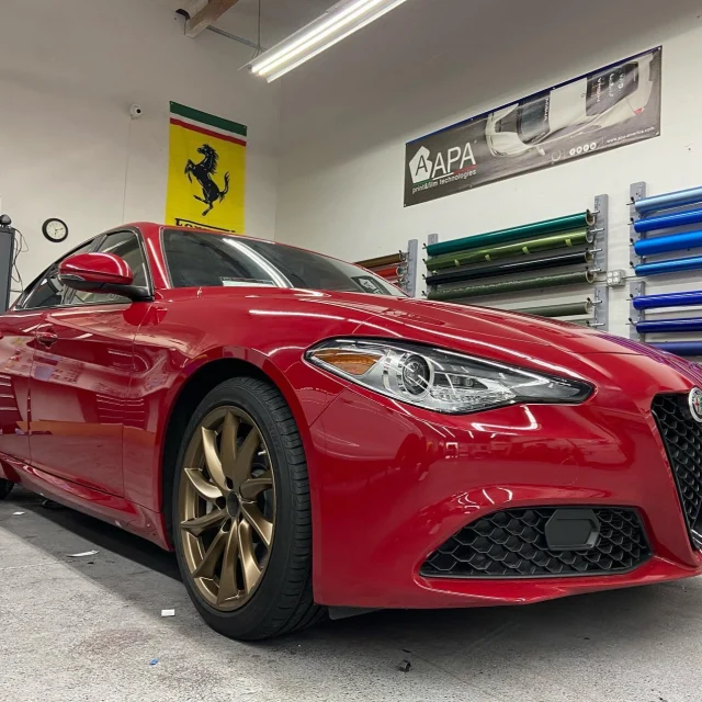 Silver sports car inside the Enhanced Automotive studio